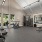large fitness center filled with natural light