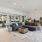 large clubroom with large couch and rug
