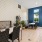 seating area with blue accent wall