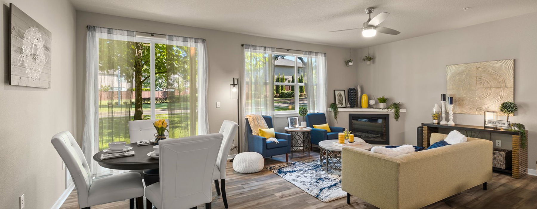 living room with wood flooring and a fireplace