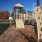 outdoor playground with climbing equipment and slides